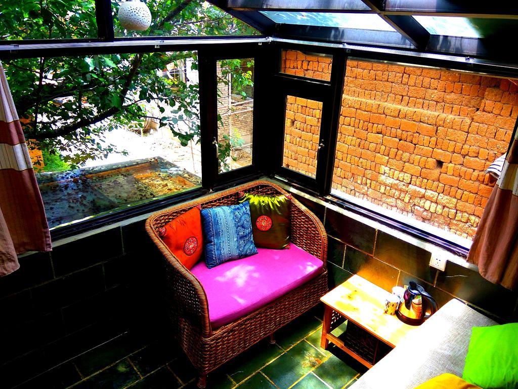 Lijiang Baisha Free Time Designed Hotel Exterior foto