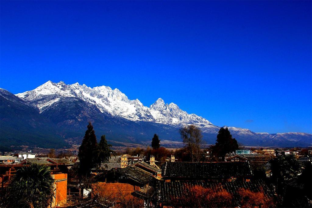 Lijiang Baisha Free Time Designed Hotel Exterior foto