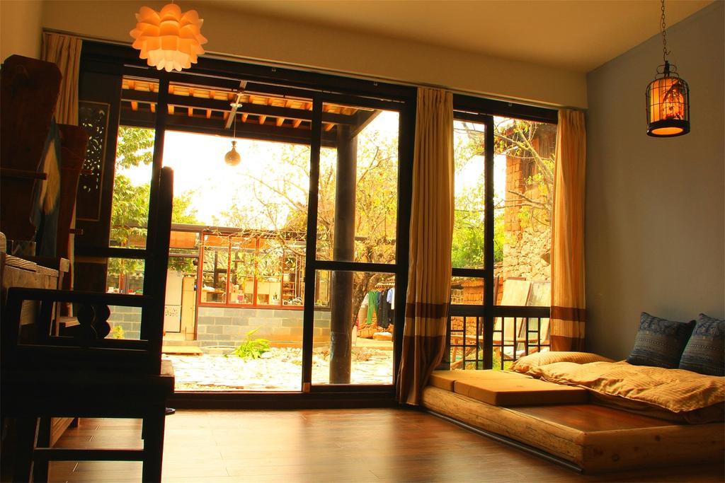 Lijiang Baisha Free Time Designed Hotel Exterior foto