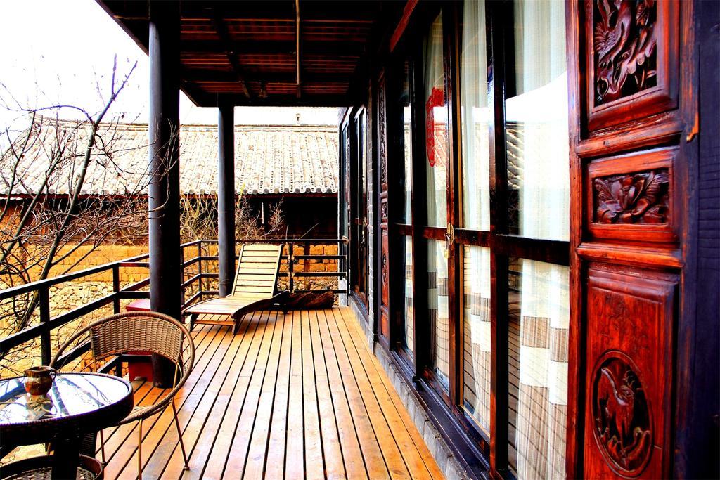 Lijiang Baisha Free Time Designed Hotel Exterior foto
