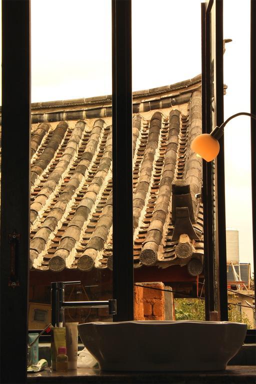 Lijiang Baisha Free Time Designed Hotel Exterior foto