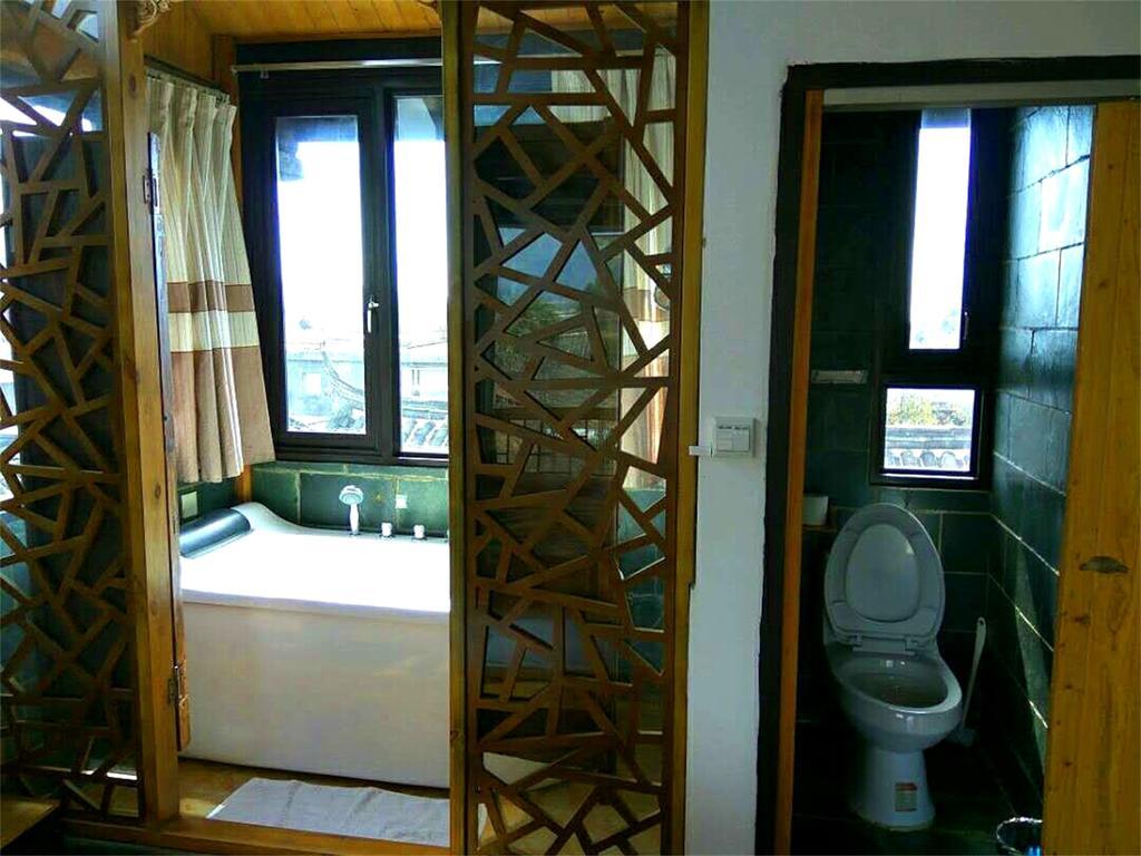 Lijiang Baisha Free Time Designed Hotel Exterior foto