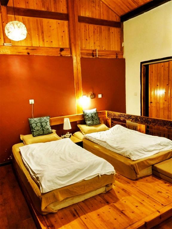 Lijiang Baisha Free Time Designed Hotel Exterior foto