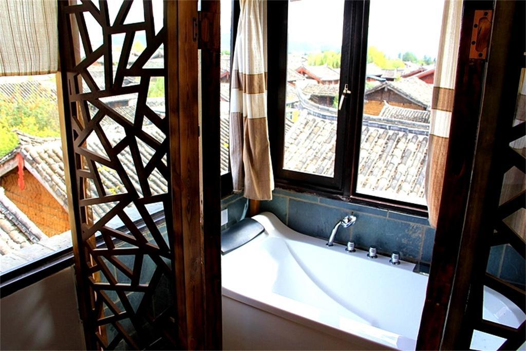 Lijiang Baisha Free Time Designed Hotel Exterior foto