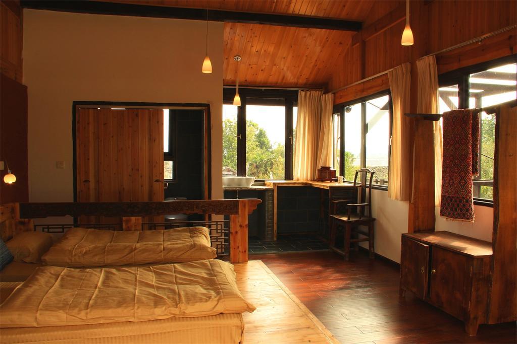 Lijiang Baisha Free Time Designed Hotel Exterior foto