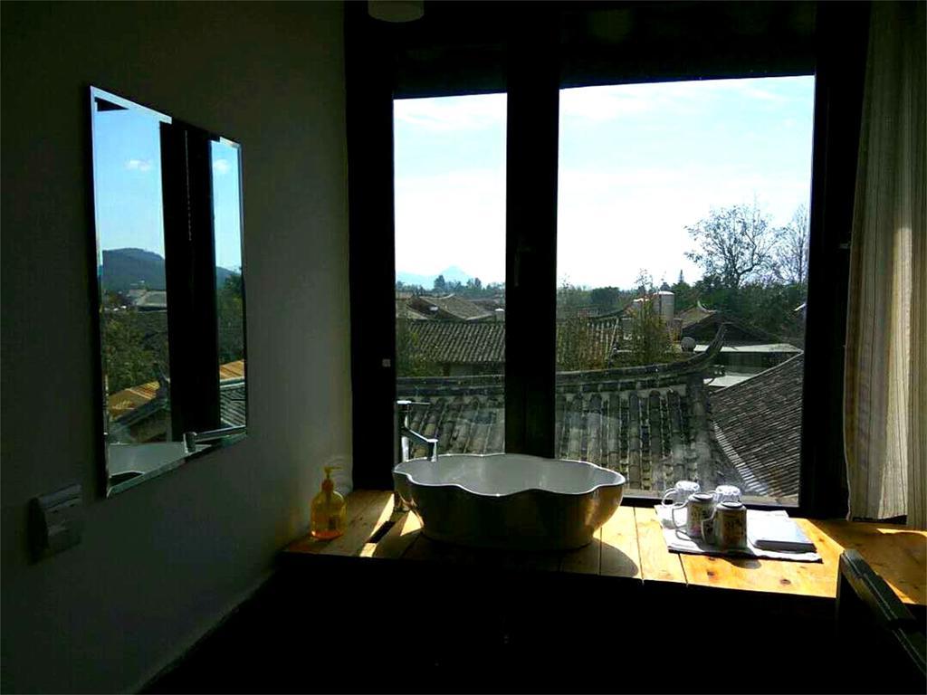 Lijiang Baisha Free Time Designed Hotel Exterior foto